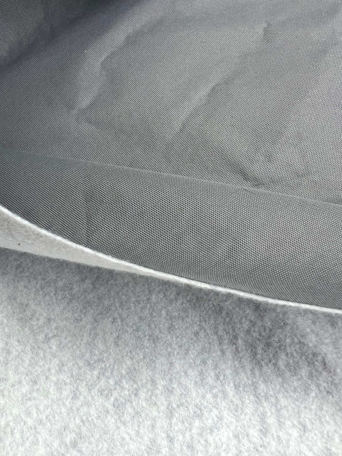 Grey_soft_lined_solution_dyed_polyester_close_up