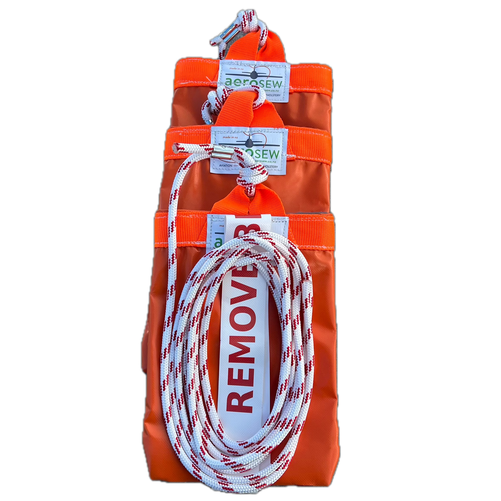 Set of three orange Aerosew PVC rotor blade tie-downs for a Cabri G2, with red-and-white rope and Remove Before Flight streamers.