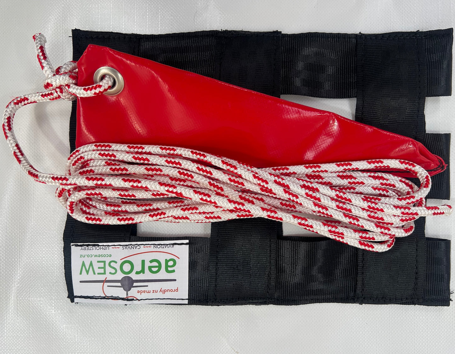 Single Hughes 500 rotor blade tie-down with black webbing, red reinforced PVC and 6 mm yachting rope.